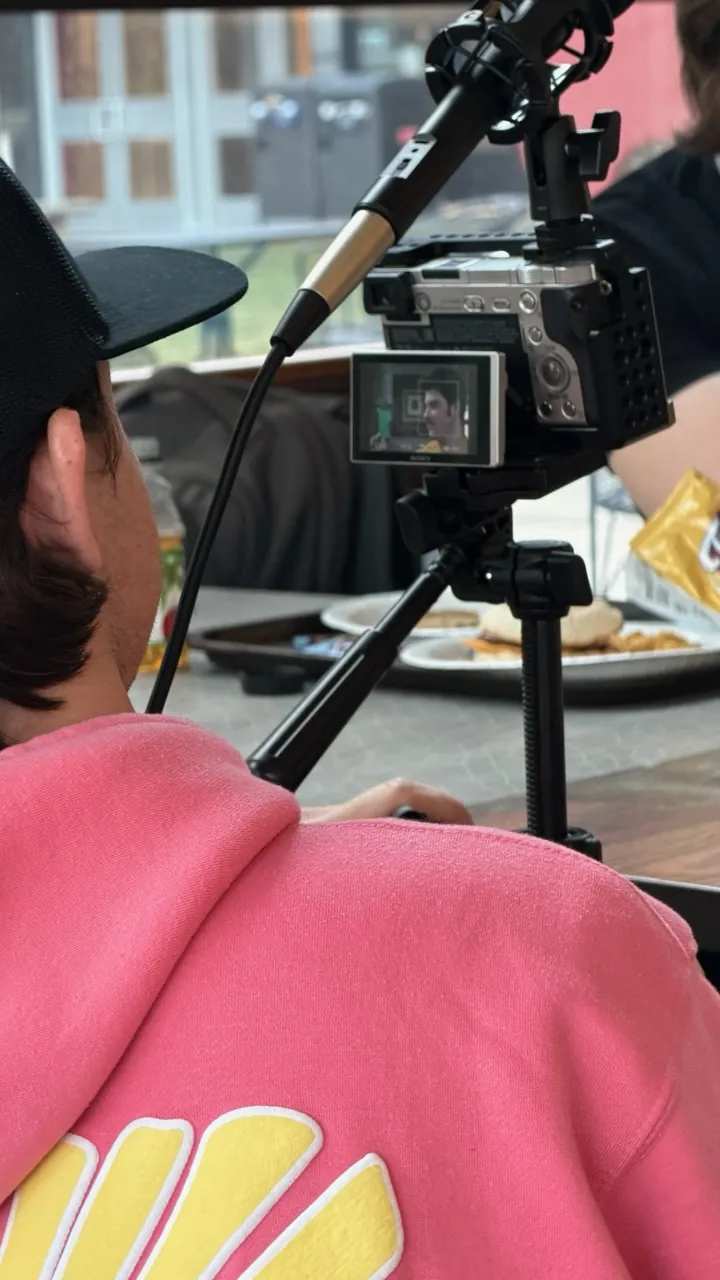 Camera operator filming a Trashboat scene